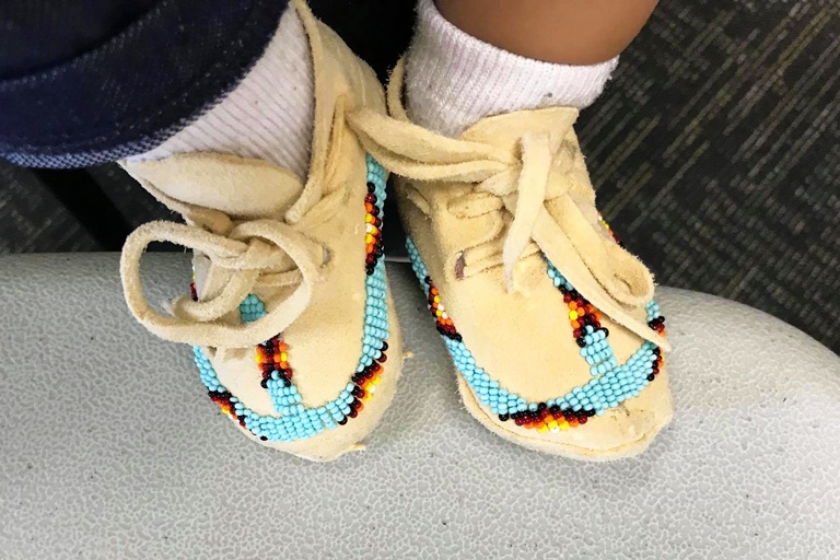 baby feet with moccasins