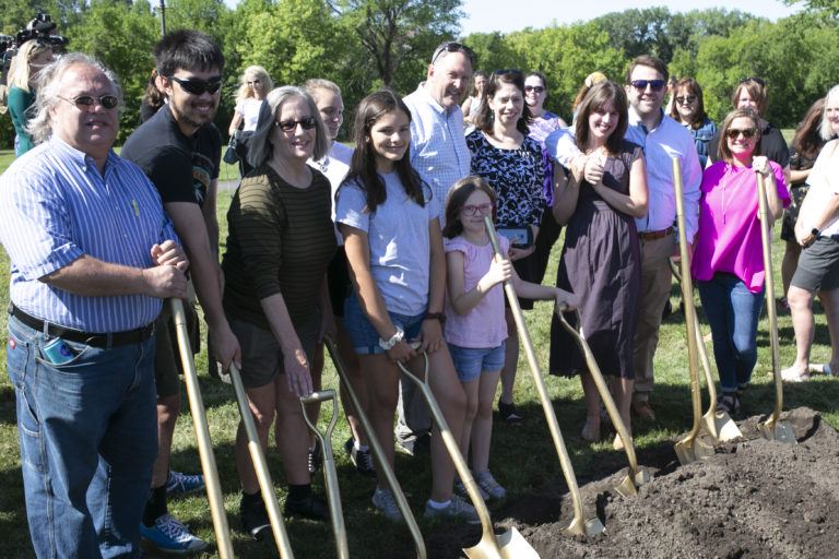 Break the Silence Groundbreaking of memorial for survivors of sexual assault - people standing by shovels